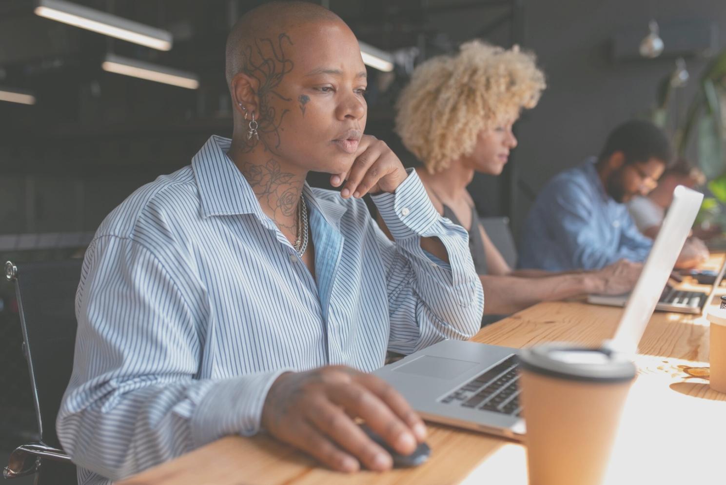 Student working with calendar planning materials and financial worksheets